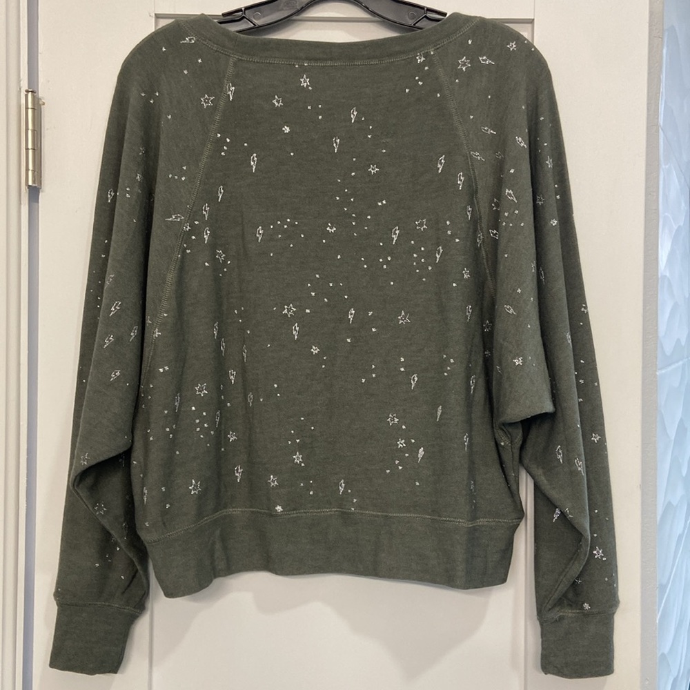 Women's Green Chaser top embellished w/ silver lightning bolts & stars. Size S - Picture 2 of 6